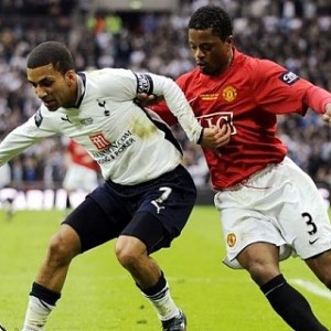 Evra & Lennon fighting for possession.