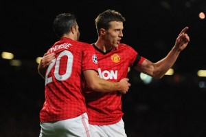Carrick celebrates with Van Persie