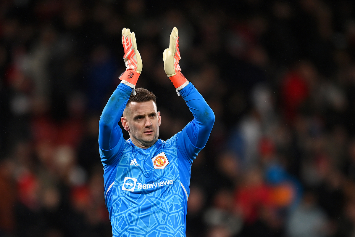 Tom Heaton applauds the Man United fans.