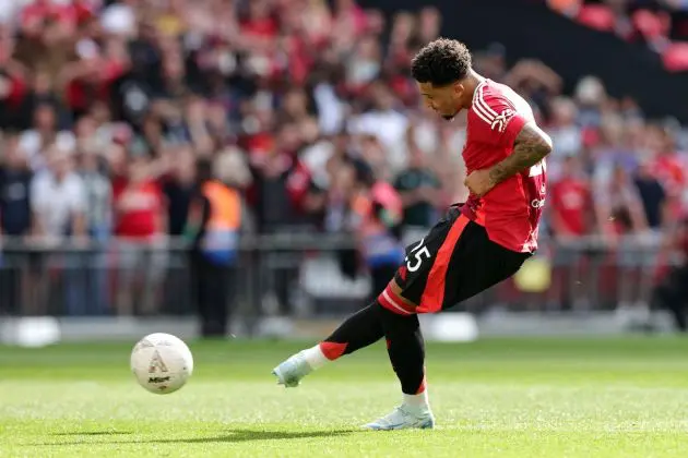 Jadon Sancho kicking the ball