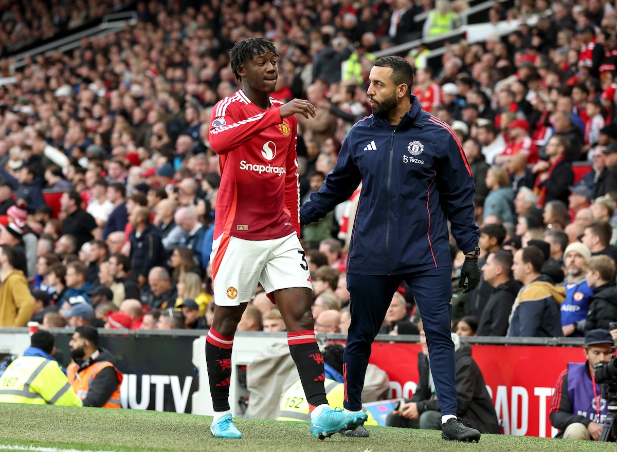 Kobbie Mainoo leaves the pitch with an injury during the Premier League match between Manchester United and Tottenham Hotspur