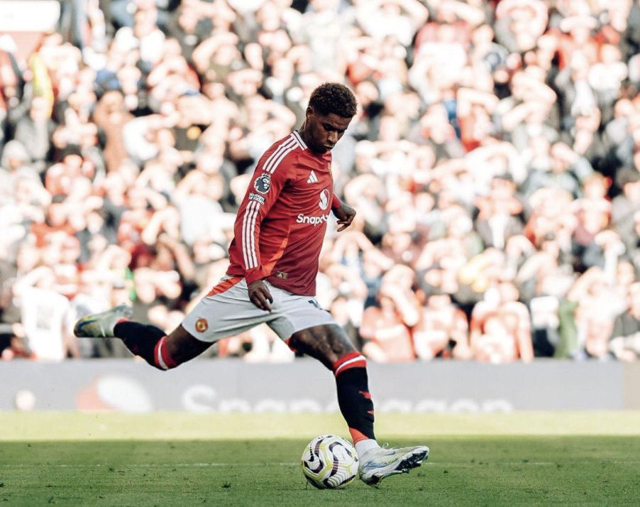 Marcus Rashford kicking the ball