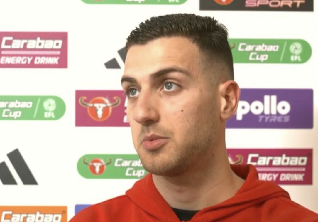 Diogo Dalot chatting with press
