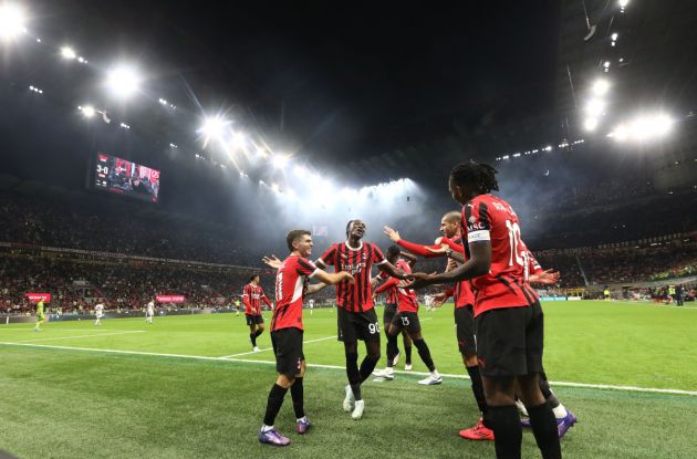 Christian Pulisic celebrates with his teammates.