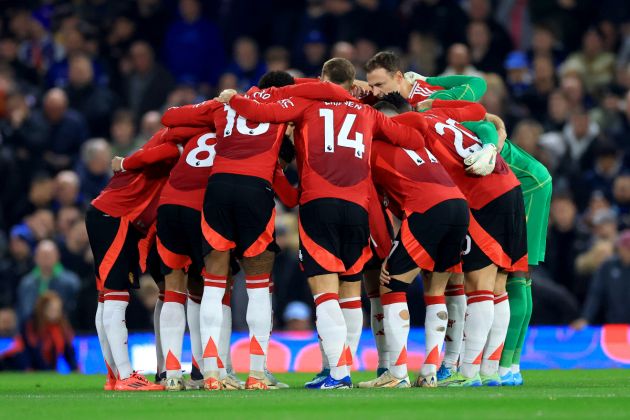 Andre Onana huddles with his teammates pre-match.