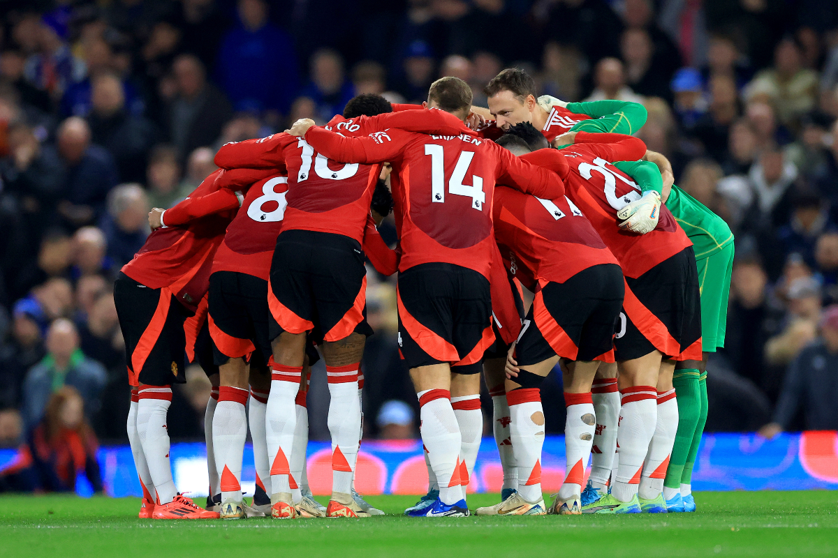 Andre Onana huddles with his teammates pre-match.