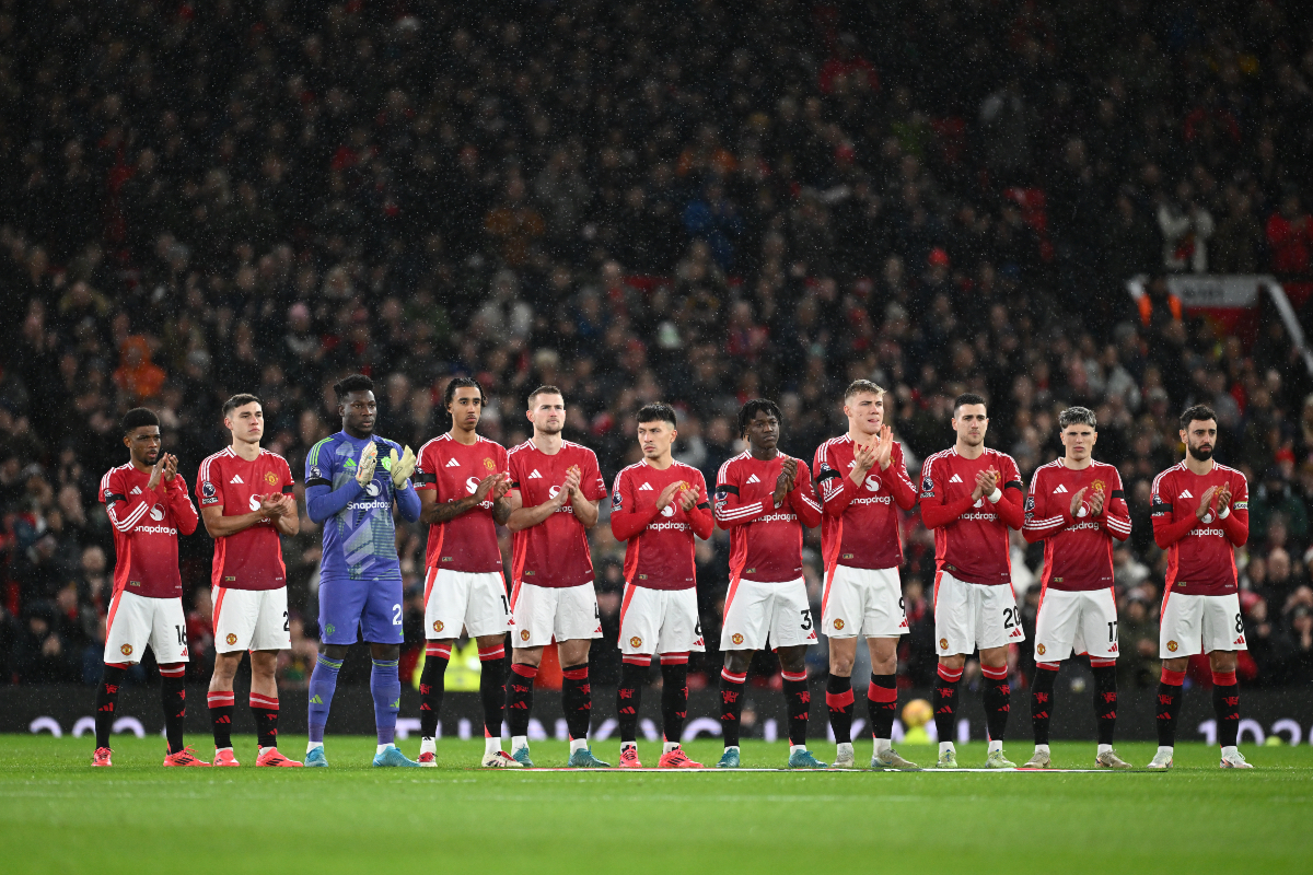 Manchester United players in a minute of silence