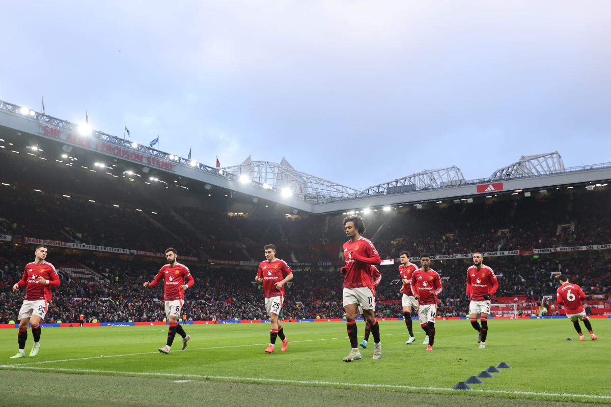 Amad Diallo warms up at Old Trafford.