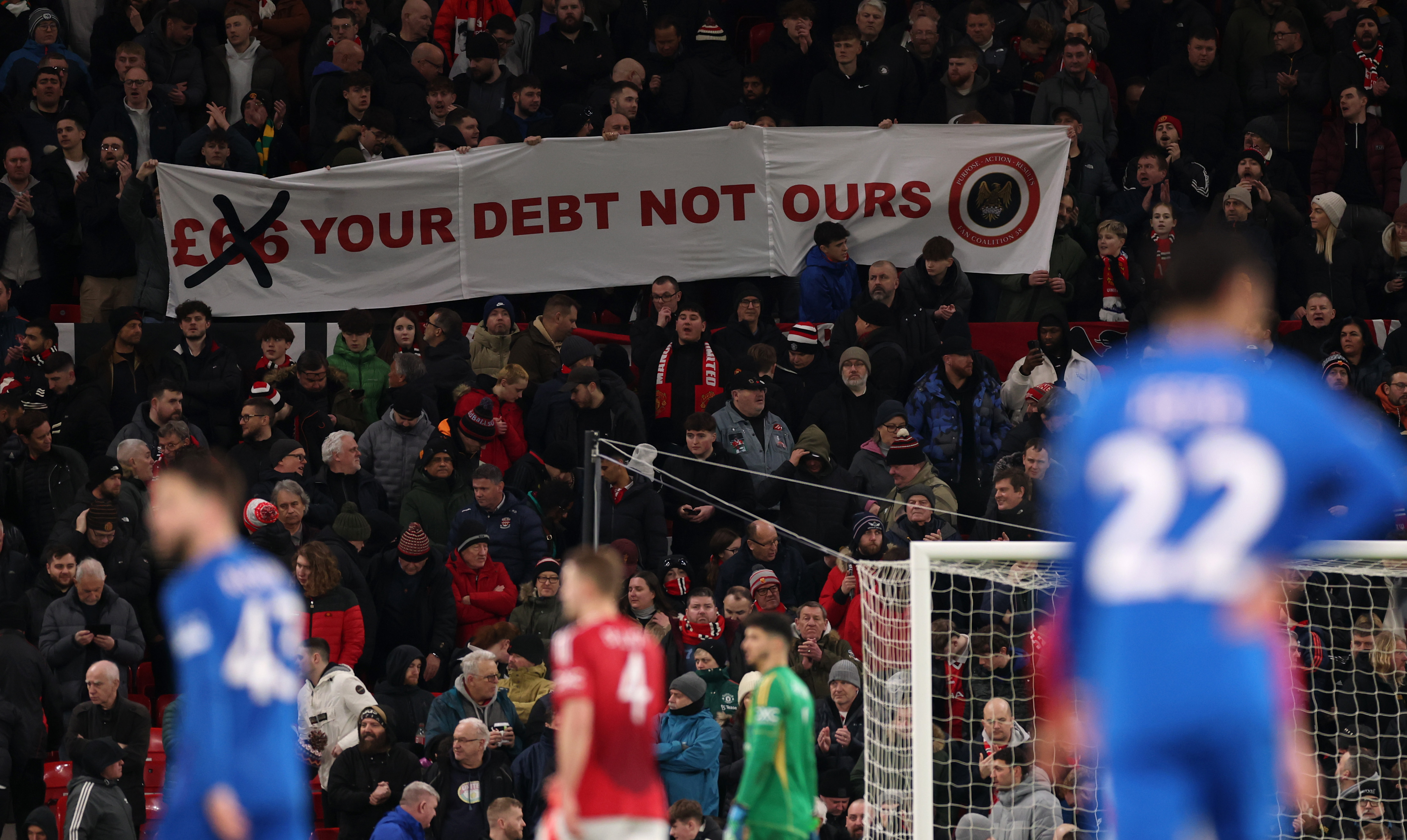 Manchester United fans protesting against ticket prices