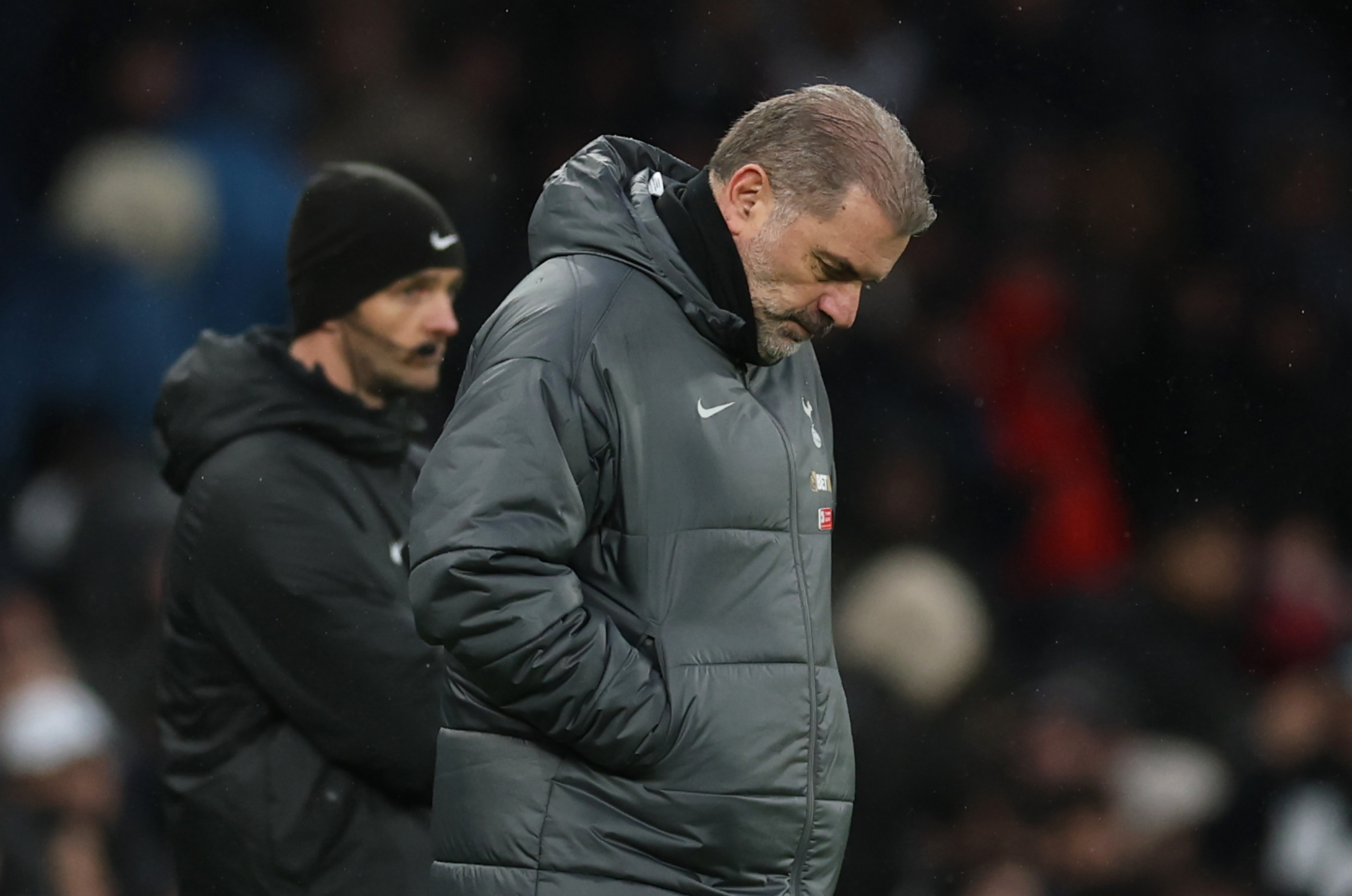 Ange Postecoglou drops his head as Tottenham fall to a 2-1 defeat to Leicester.