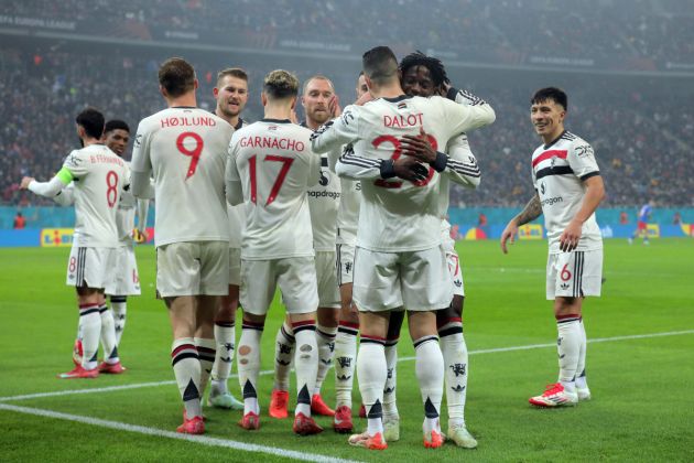 BUCHAREST, ROMANIA - JANUARY 30: Diogo Dalot of Manchester United celebrates scoring his team's first goal with teammate Kobbie Mainoo during the UEFA Europa League 2024/25 League Phase MD8 match between Fotbal Club FCSB and Manchester United at National Arena on January 30, 2025 in Bucharest, Romania.