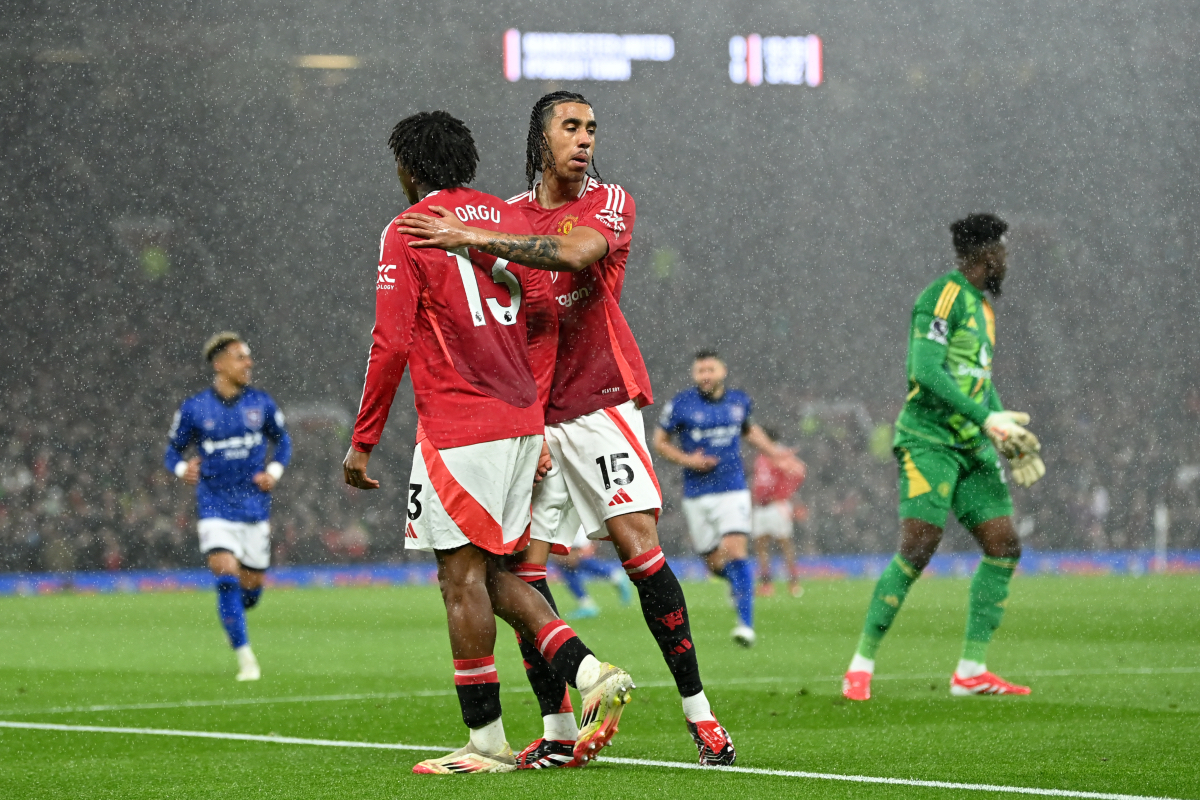 Leny Yoro consoles Patrick Dorgu after Man United concede an early goal to Ipswich.