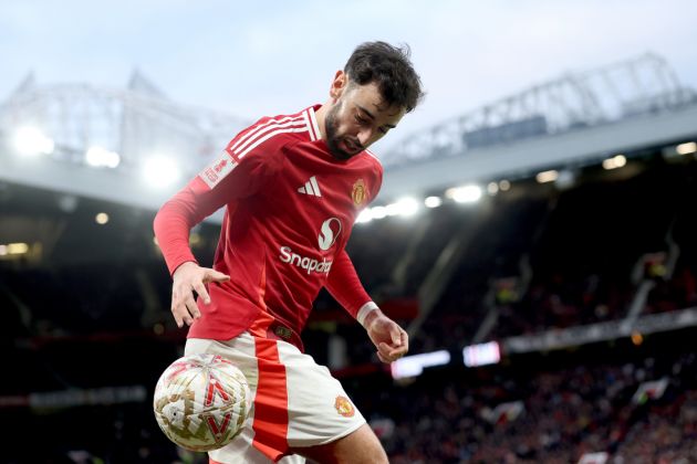 Bruno Fernandes takes the ball while in action for Man United.