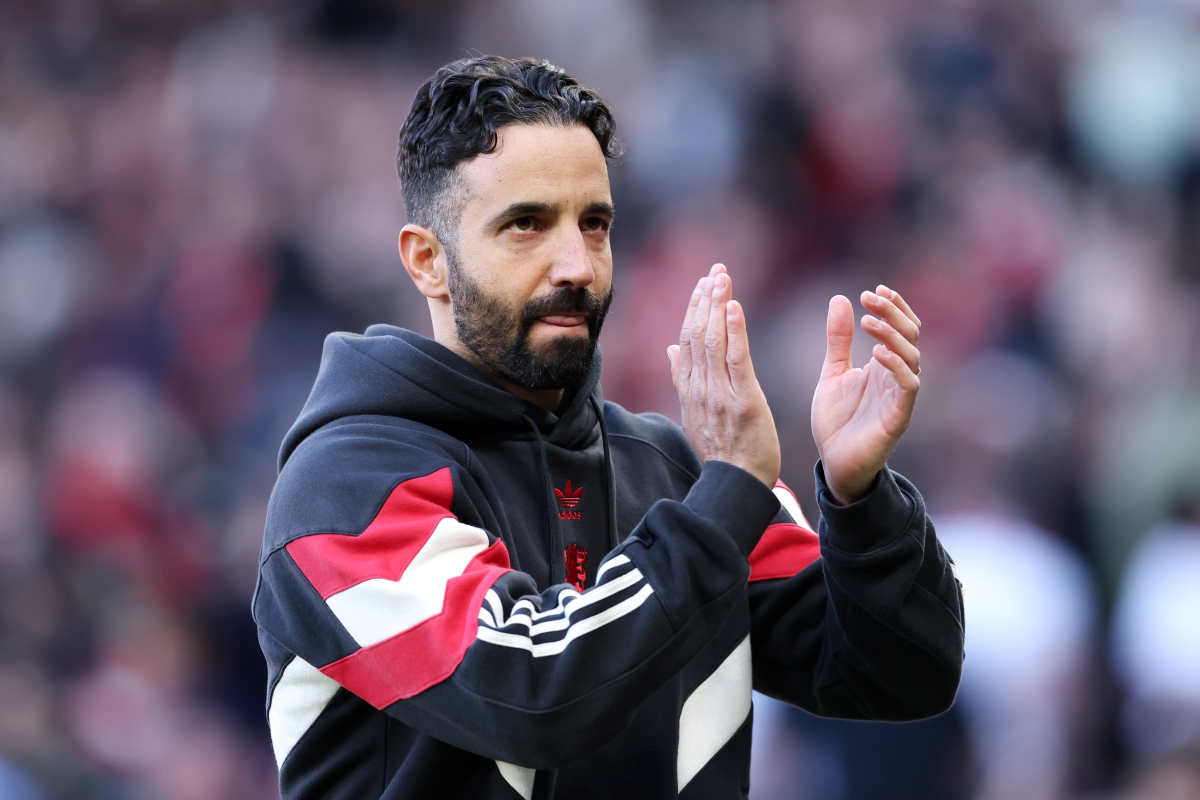 Ruben Amorim applauds the Man United fans.