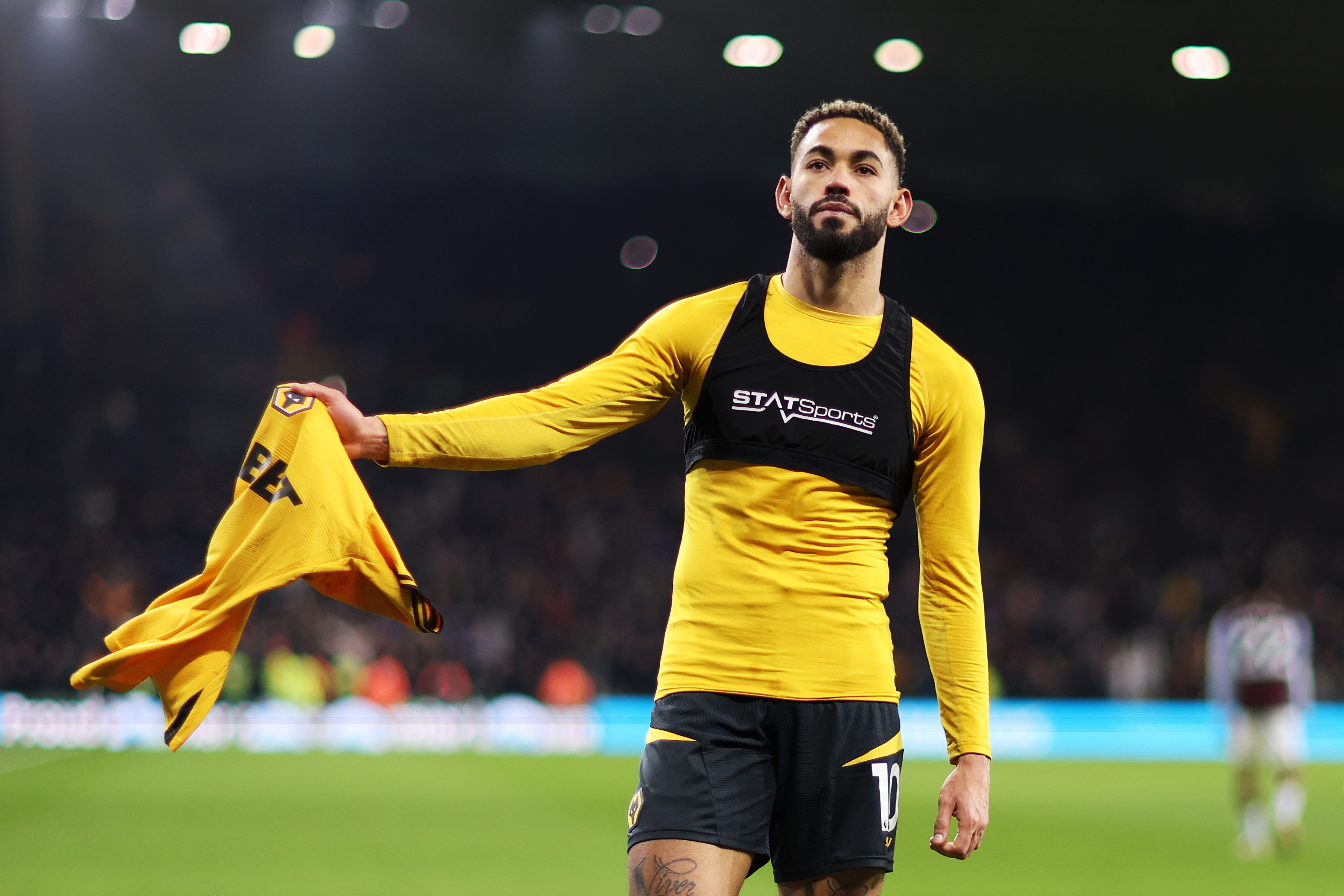 Matheus Cunha saluting Wolves supporters