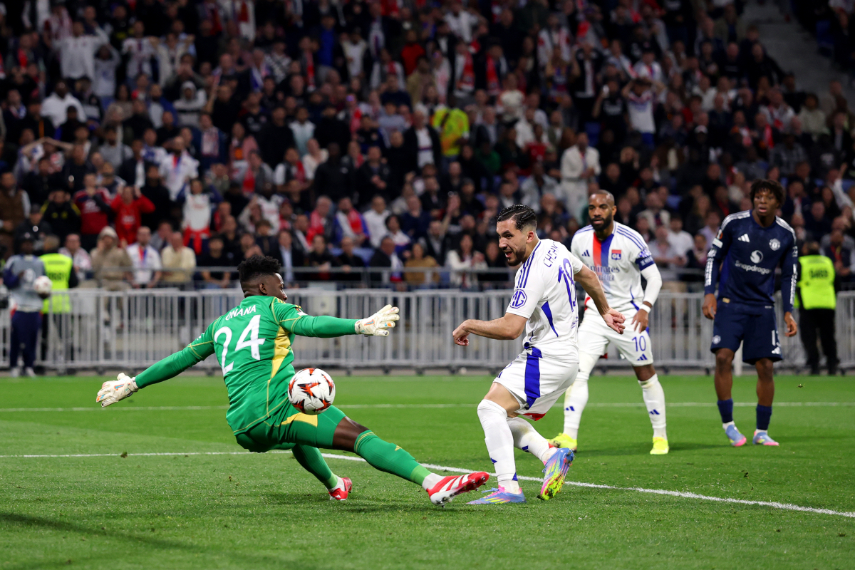 Rayan Cherki scoring in Andre Onana's goal