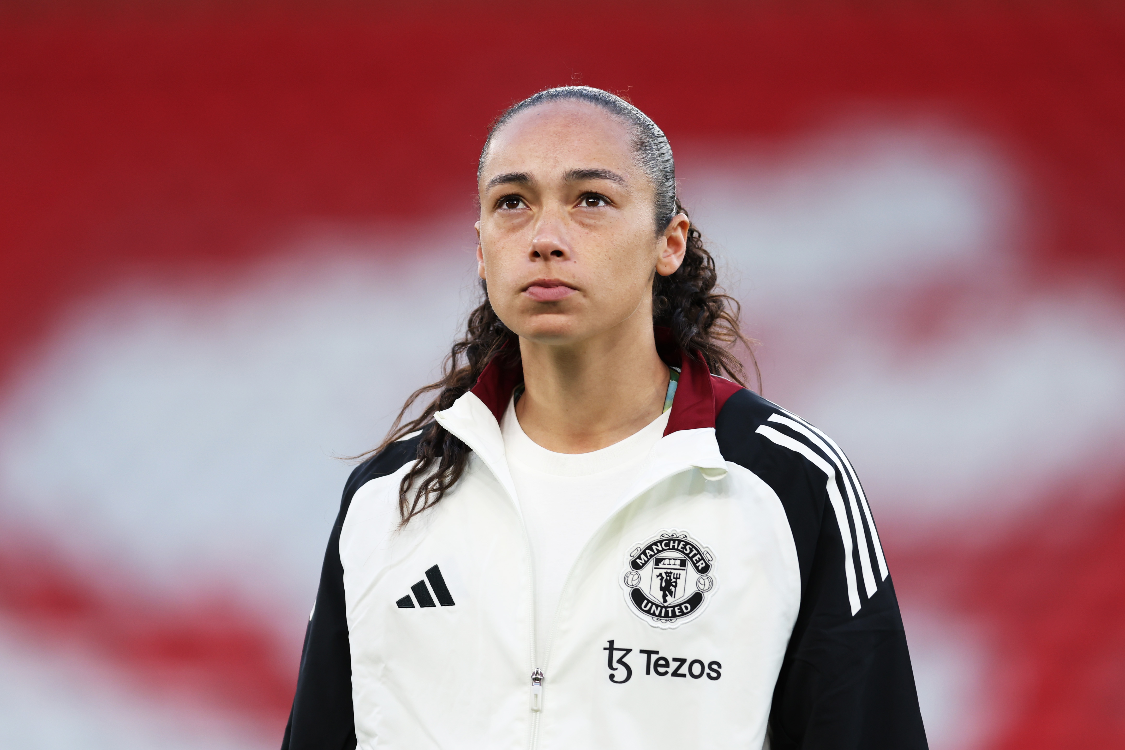 Phallon Tullis-Joyce inspects the pitch ahead of Man United’s clash with Liverpool.