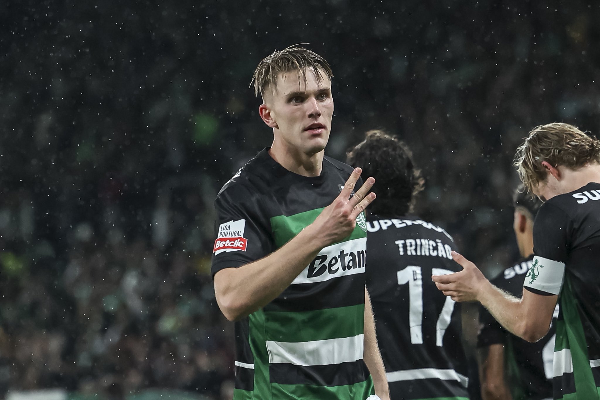 Viktor Gyokeres holds up three fingers after scoring a hat-trick for Sporting Lisbon.