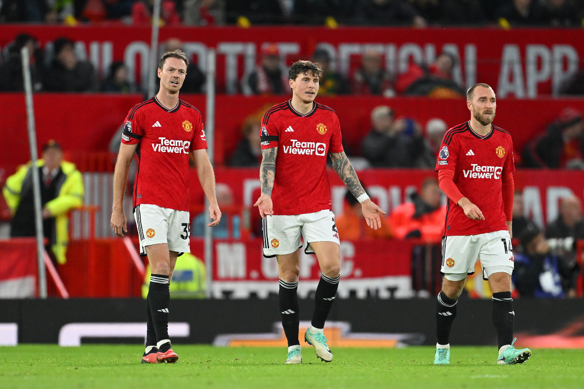 Jonny Evans, Christian Eriksen and Victor Lindelof react after Man United concede at Old Trafford.