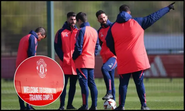 Ruben Amorim chats with his coaching staff during a training session at Carrington.
