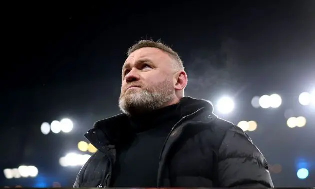 Wayne Rooney looking on