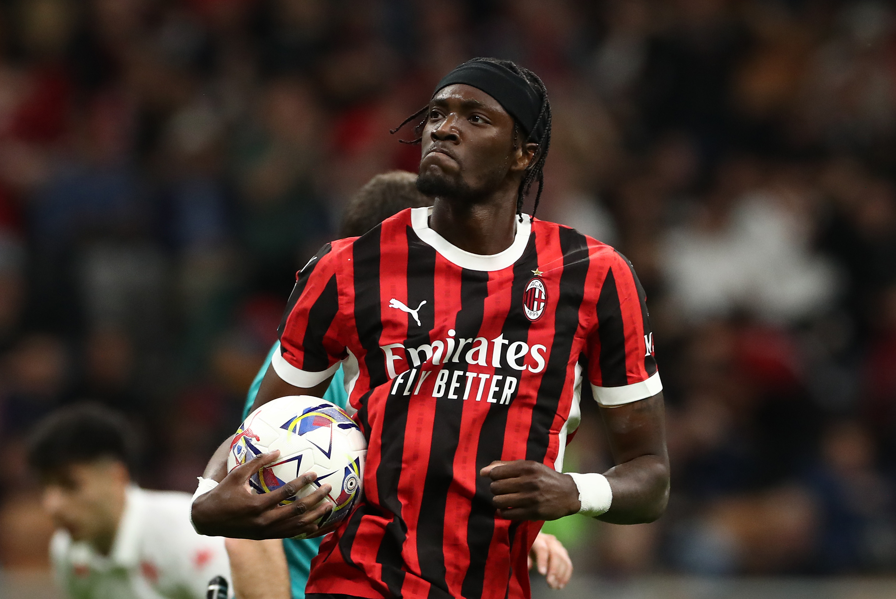 Tammy Abraham celebrates a goal for AC Milan at the San Siro.