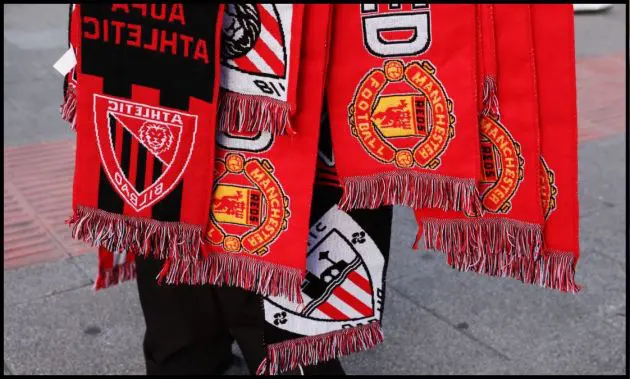 Scarves show both Athletic Bilbao and Manchester United badges.