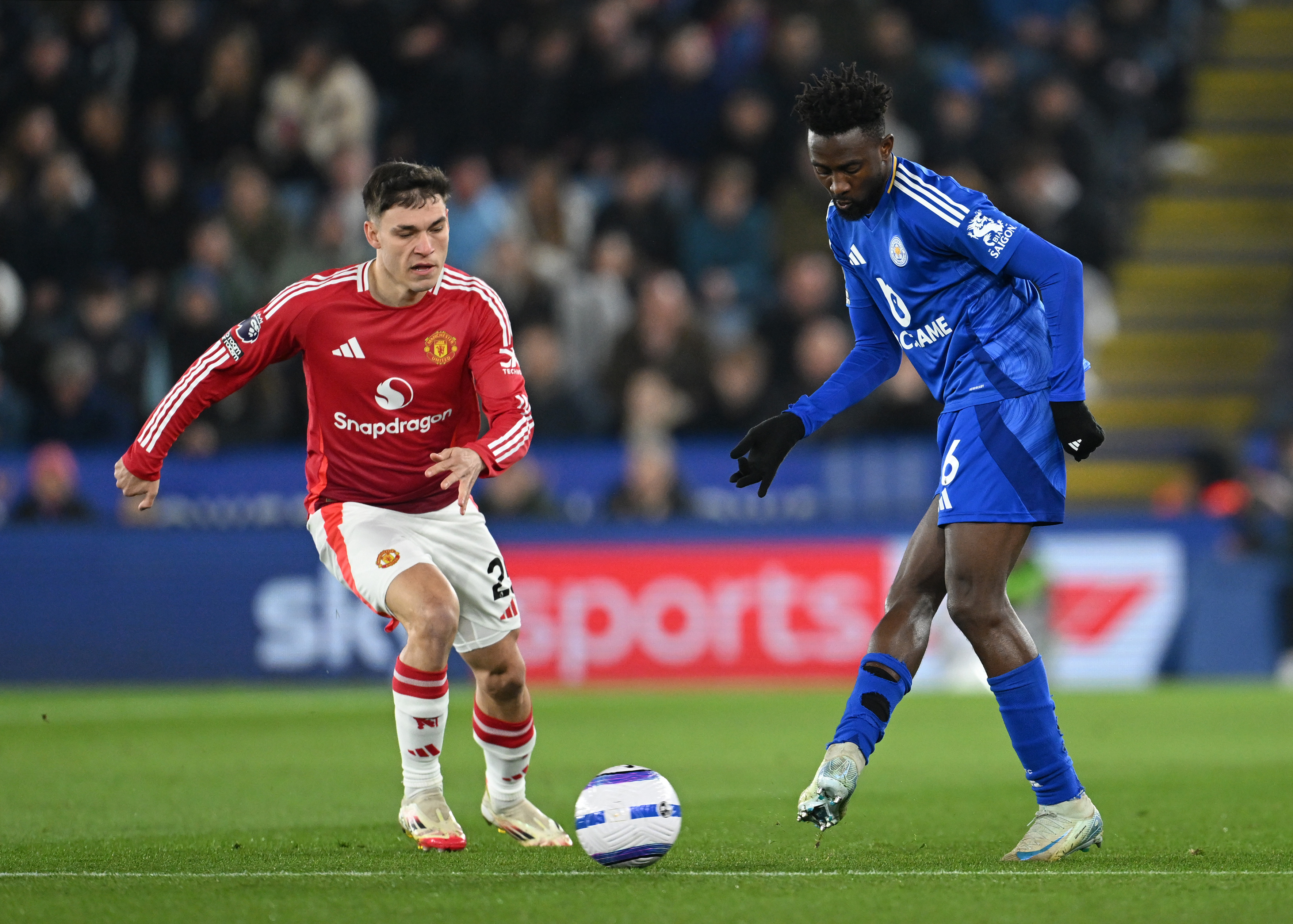 Leicester’s Wilfred Ndidi passes the ball whilst under pressure from Man United’s Manuel Ugarte.