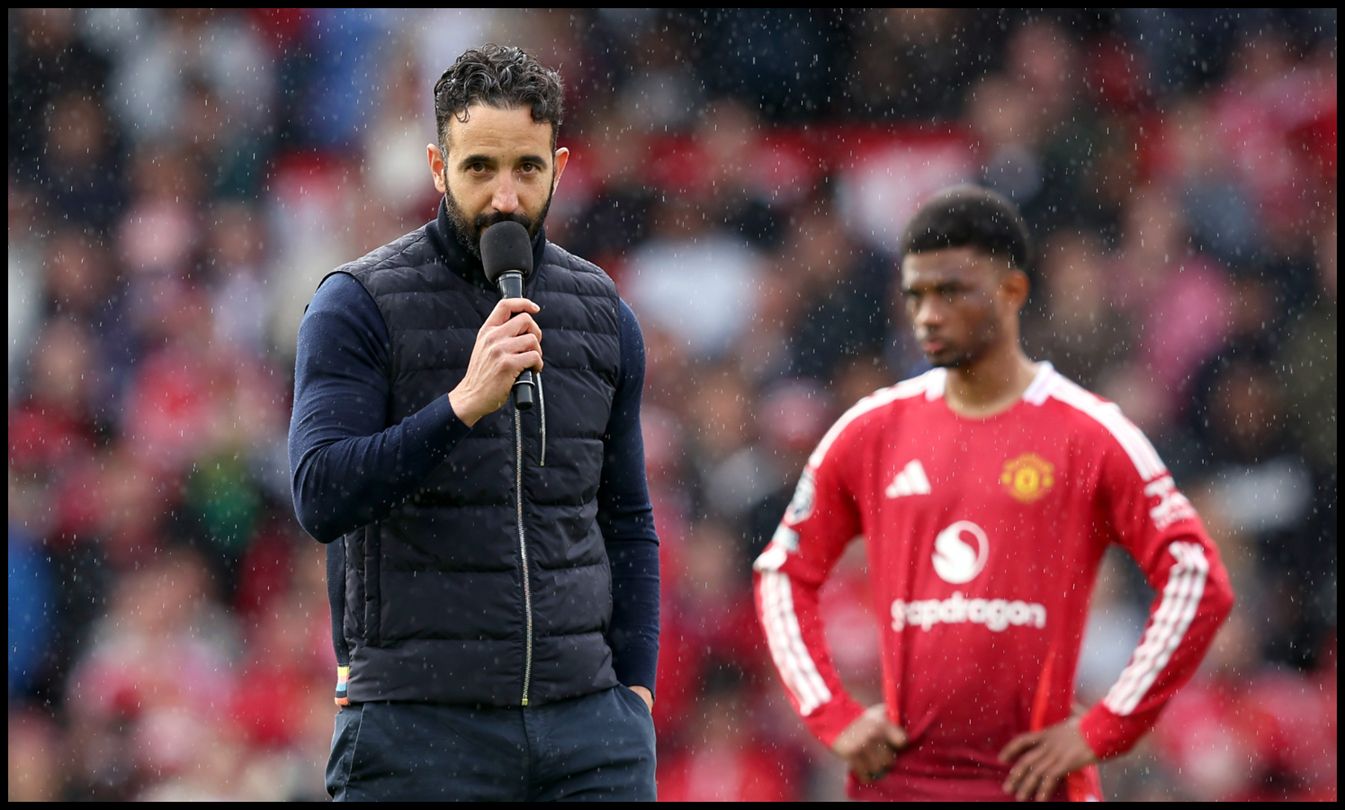 Ruben Amorim holds a microphone to speak to Old Trafford crowd.