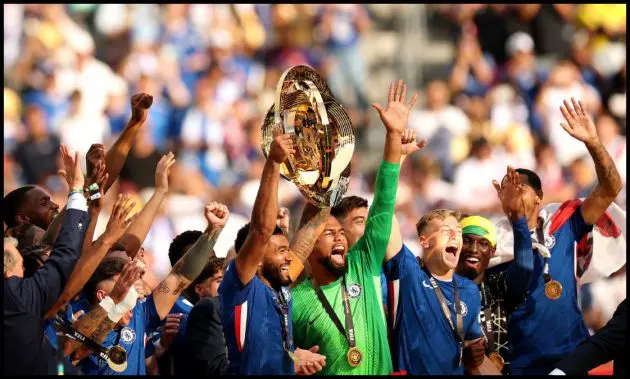 Reece James lifts the Club World Cup trophy with his Chelsea teammates.