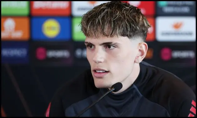 Alejandro Garnacho speaks to reporters at a press conference,