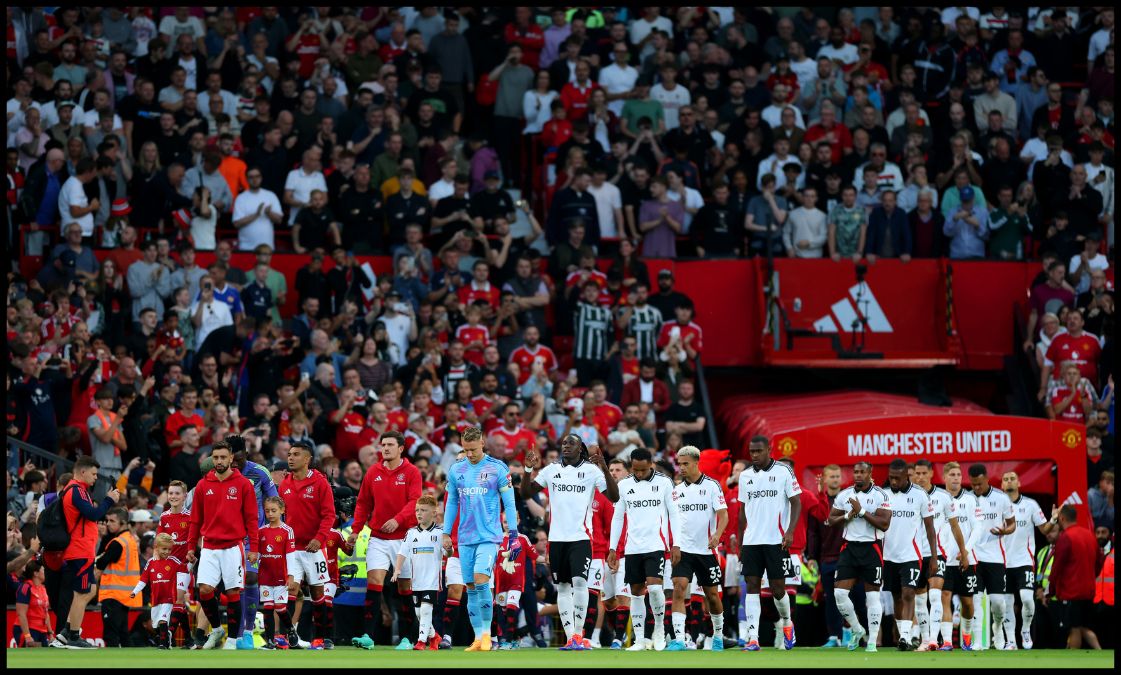 Man United and Fulham players walk out of the tunnel at Old Trafford ahead of their FA Cup tie.