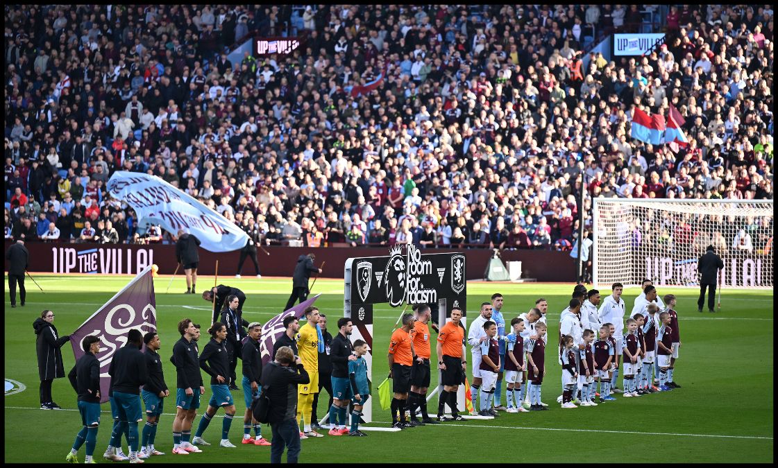 Bournemouth and Aston Villa players line up before kick-off at Villa Park.