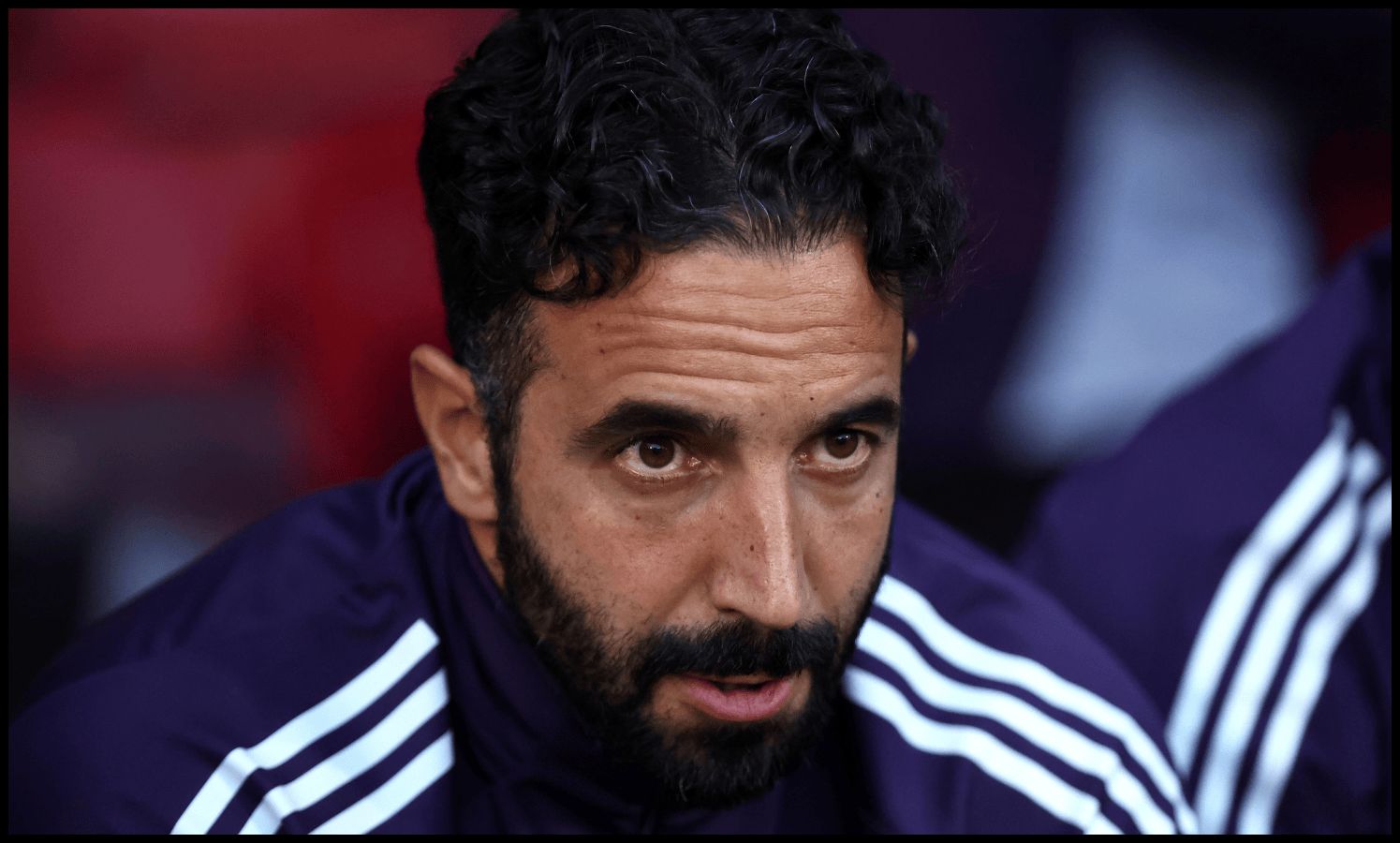 Ruben Amorim looks concerned from the dugout at Blundell Park.