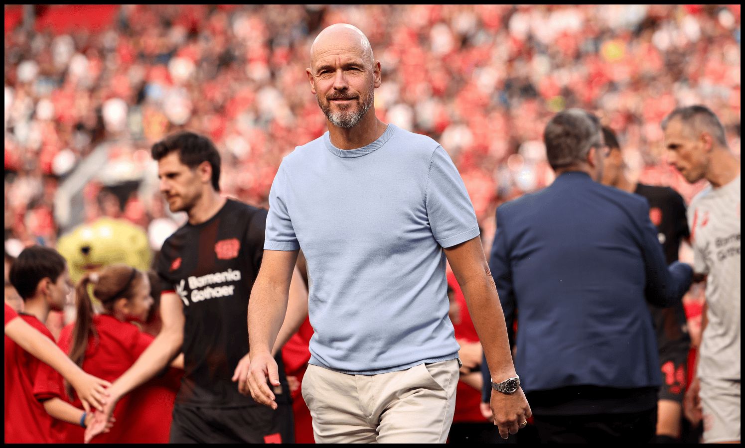 Erik ten Hag looks on before Bayer Leverkusen kick off.
