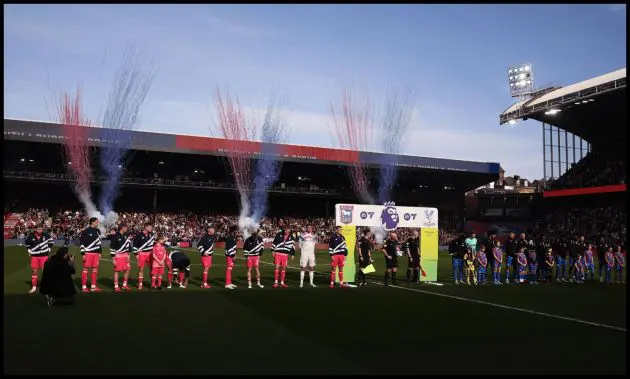 Crystal Palace players line up at Selhurst Park.