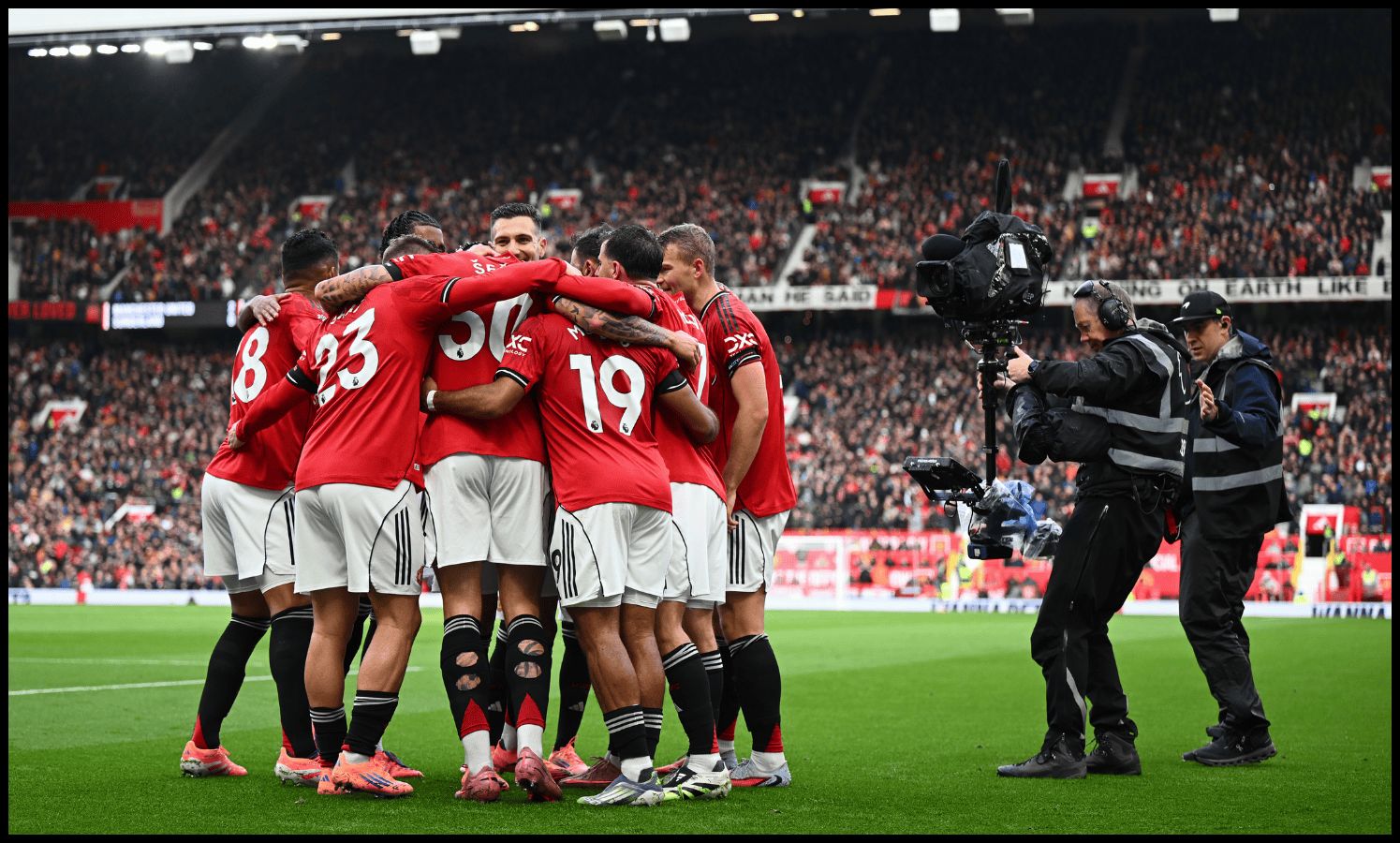 Man United players celebrate at Old Trafford.