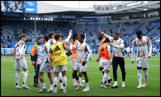 Real Madrid players warm up before kick-off.