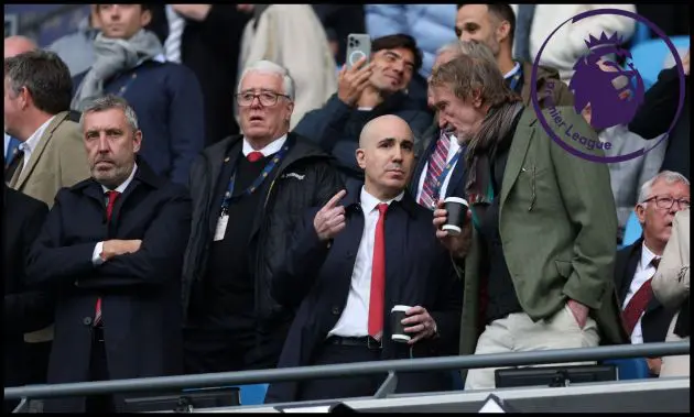 Manchester United officials in the stands