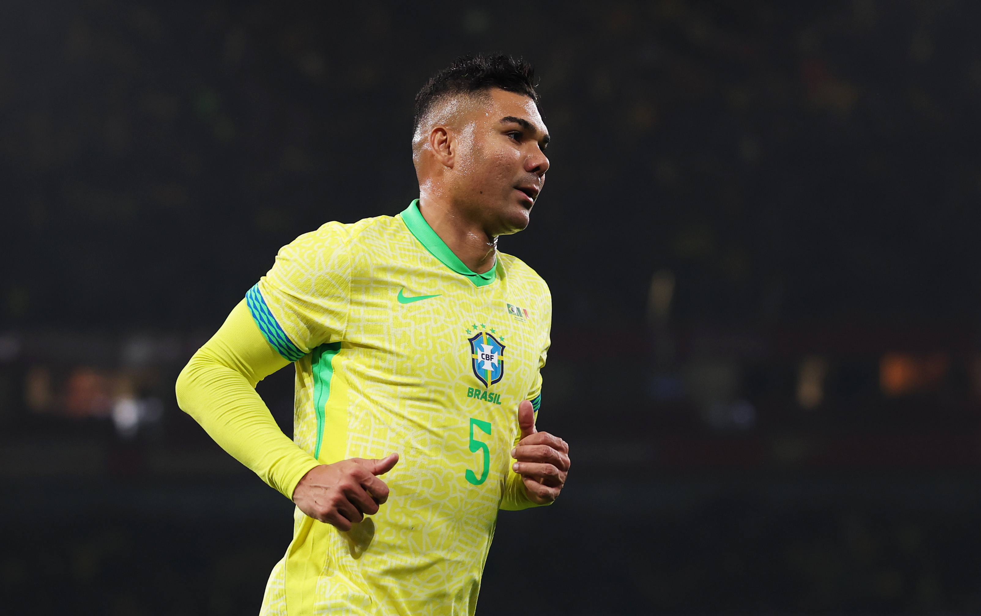 Casemiro celebrates scoring for Brazil vs Senegal.