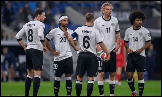 German players chat before taking a set-piece.