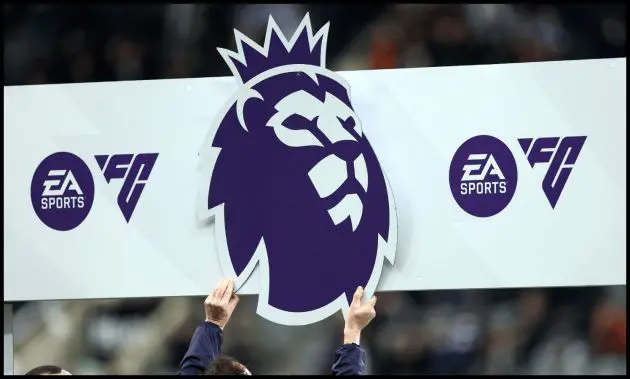 A Premier League board is held up ahead of kick-off at St. James’ Park.