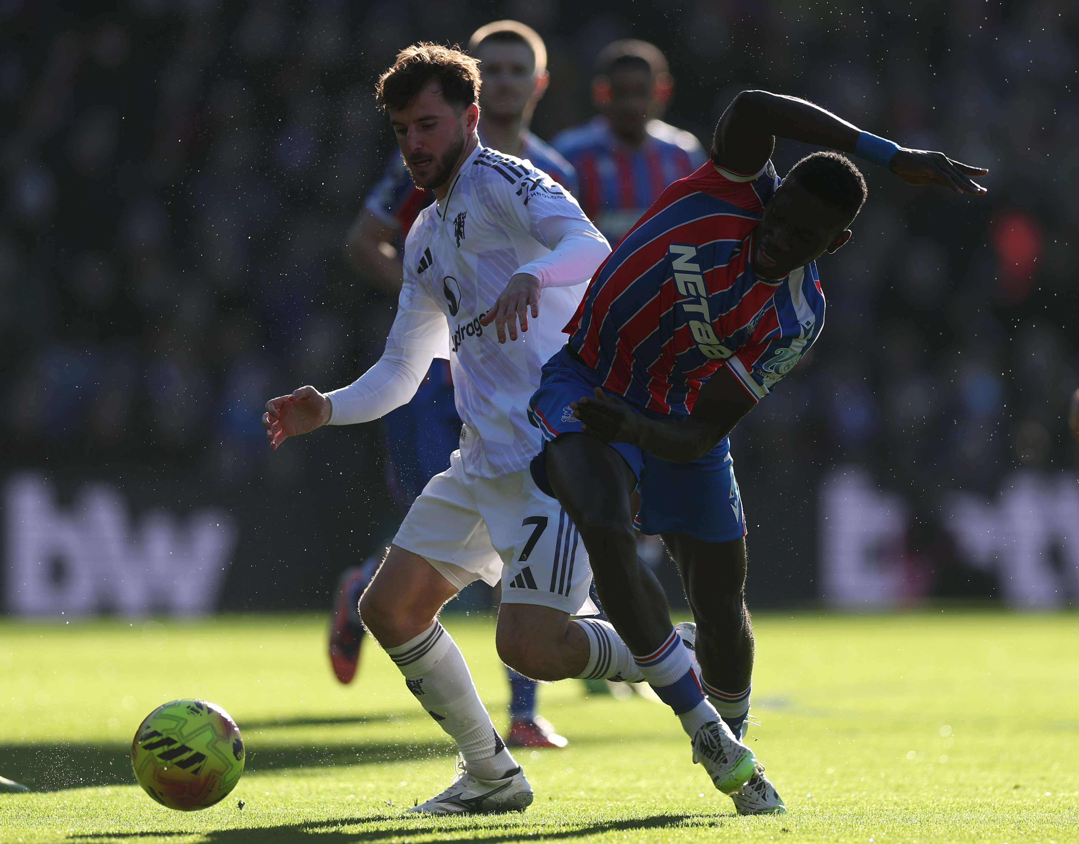 Mason Mount vies for possession with Ismaila Sarr.