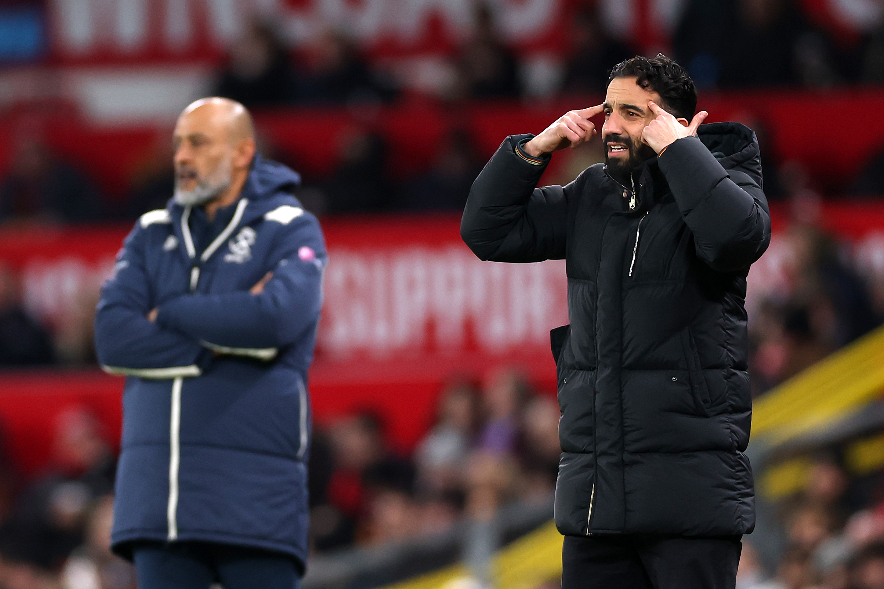 Ruben Amorim gestures to his players from the touchline.