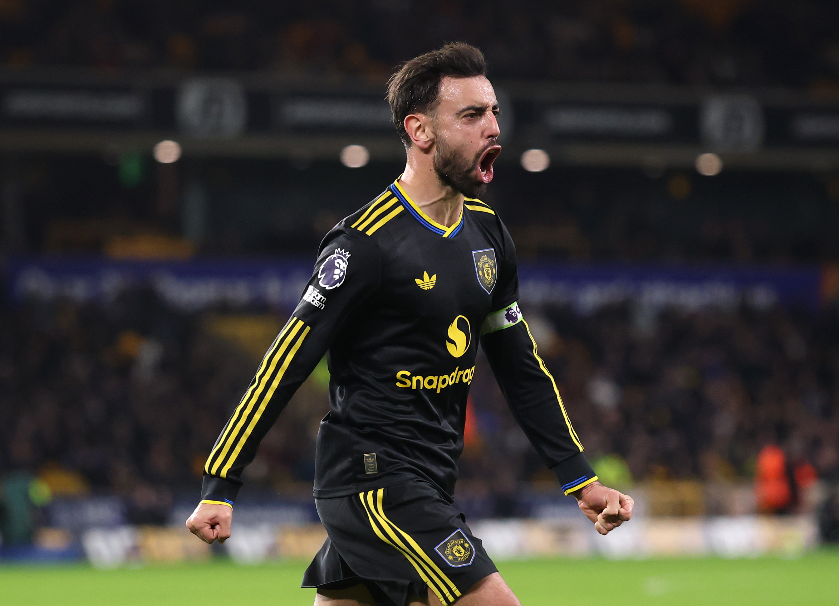 Bruno Fernandes celebrates scoring against Wolves.