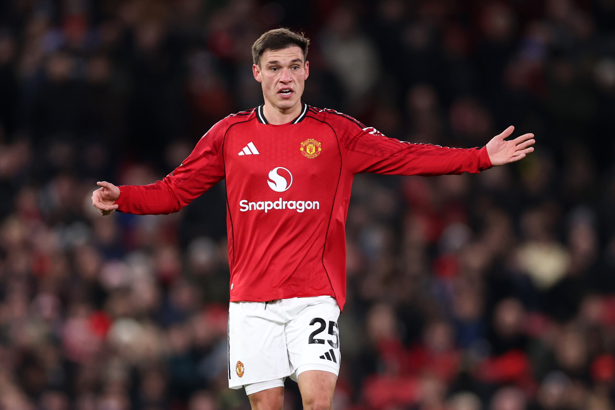 Manuel Ugarte gestures while in action for Man United.