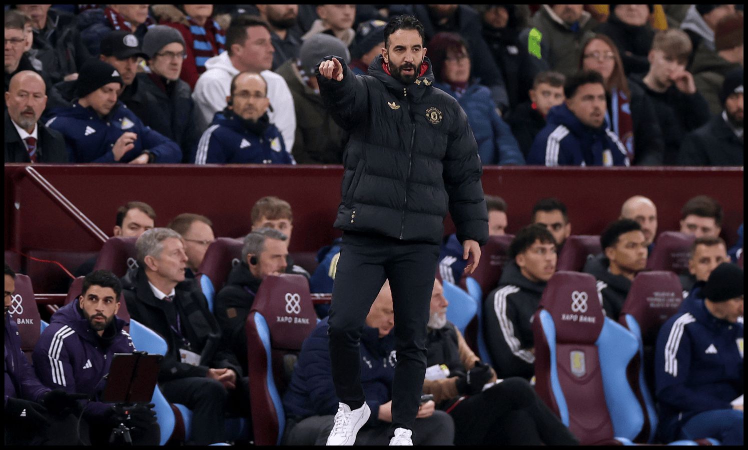 Ruben Amorim instructs his Man United team from the touchline at Vila Park.