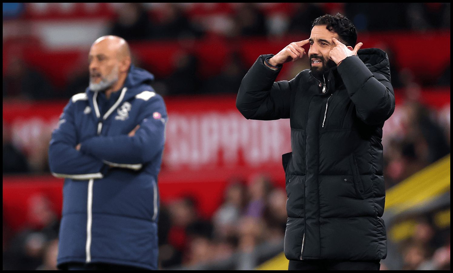 Ruben Amorim gestures to his players from the touchline.
