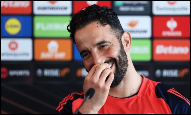 Ruben Amorim laughs during a Man United press conference.