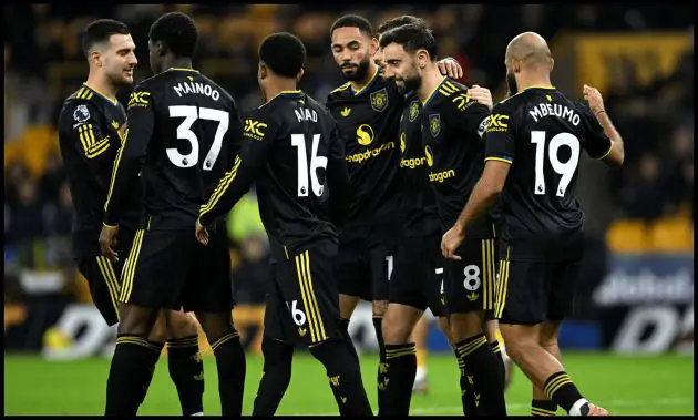 Man United players celebrate Bruno Fernandes’ goal vs Wolves.